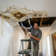 ceiling leak showing water stains and hidden roof damage