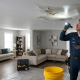 Roof damage causing ceiling water leak inside residential home during heavy rain