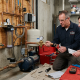 Low water pressure in a residential home caused by plumbing, water pump, or pipe-related issues.